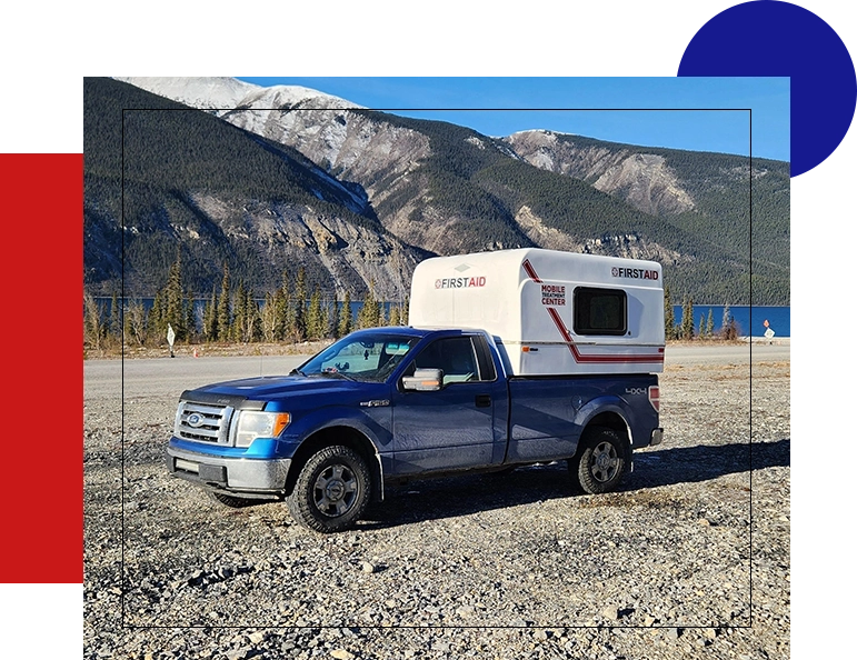 A truck with a camper in the back of it.